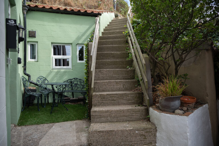 Stone steps leading to the entrance of Heart Stone Cottage